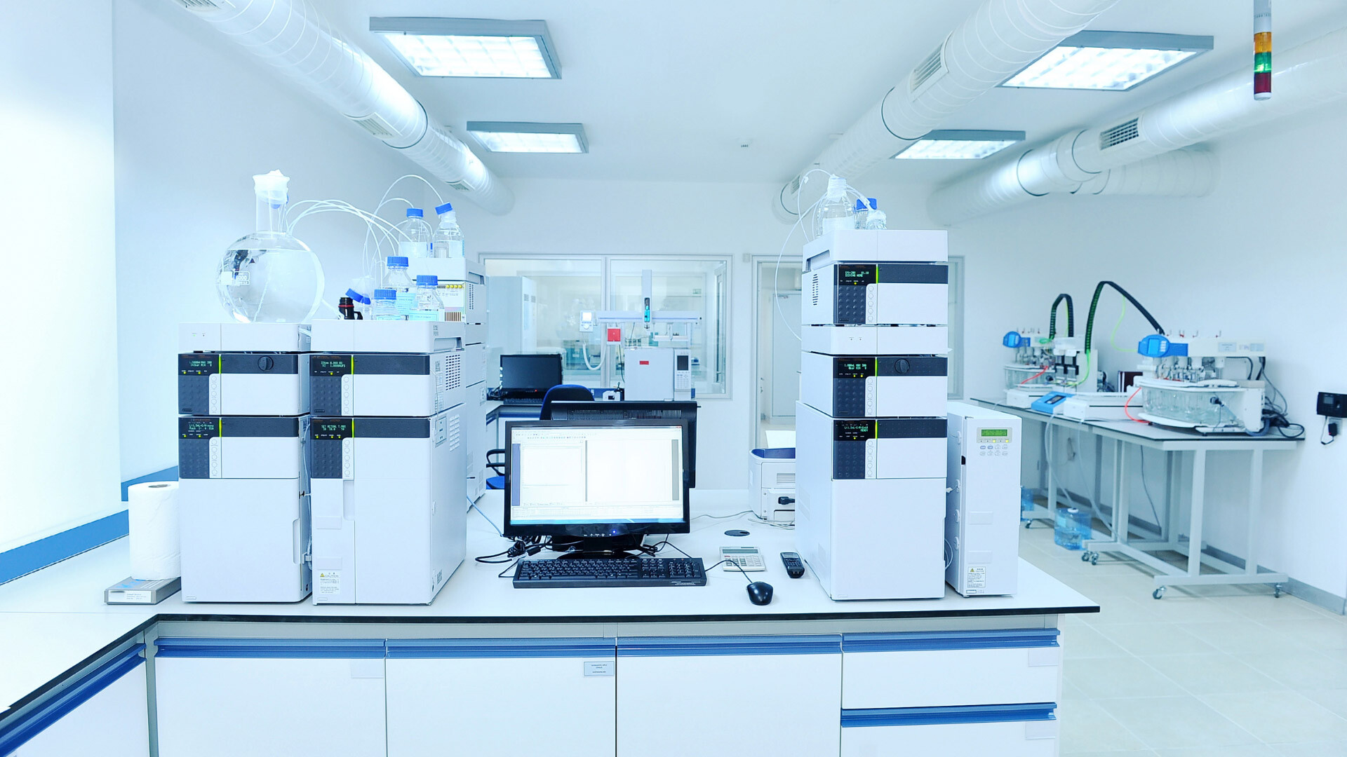 State-of-the-art analytical laboratory with several HPLC systems, central computer workstation and clean, air-conditioned environment. The laboratory architecture supports precise pharmaceutical analysis and quality assurance in accordance with GMP standards - ideal for regulatory testing in pharmaceutical and biotechnological companies. State-of-the-art analytical laboratory with several HPLC systems, central computer workstation and clean, air-conditioned environment. The laboratory architecture supports precise pharmaceutical analysis and quality assurance in accordance with GMP standards - ideal for regulatory testing in pharmaceutical and biotechnological companies.